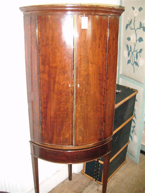 George III mahogany bow-fronted hanging corner cupboard on stand